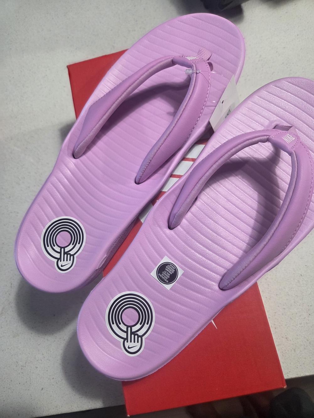 Nike Women’s Lavender Pink Flip Flops